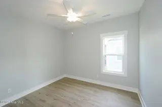 104 NE 52nd Street, Oak Island, NC 28465 – photo 13: 104 NE 52nd St Oak Island NC-large-015-0