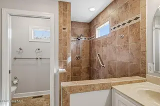 53 Country Club Drive, Shallotte, NC 28470 – photo 20: Large walk-in shower