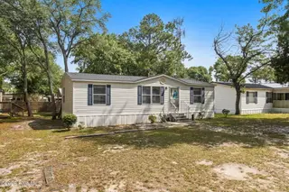 7203 Banner Street SW, Ocean Isle Beach, NC 28469 — 3-bedroom manufactured home in Seaside Heights, Ocean Isle Beach, NC, photo 1 of 38: House Front