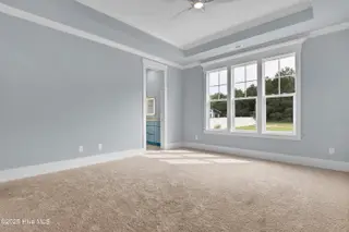 468 Summerhouse Drive, Holly Ridge, NC 28445 – photo 14: Primary has trey ceiling