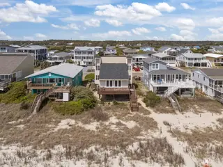 3909 W Beach Drive, Oak Island, NC 28465 – photo 12: 18-web-or-mls-DJI_20260408140642_0425_D
