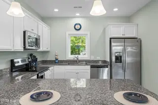 334 NE 54th Street, Oak Island, NC 28465 – photo 13: 79-web-or-mls-CAMMediaLLC.com -301