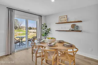 7111 Woodline Drive SW, Sunset Beach, NC 28468 – photo 22: Seaside Palms_Model_Venture_6911 Seaside