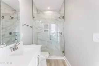 126 Shell Road, Surf City, NC 28445 – photo 22: 126 primary shower