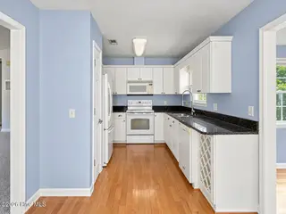 121 NE 6th Street, Oak Island, NC 28465 – photo 7: Kitchen View