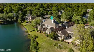 837 Fox Ridge Lane, Wilmington, NC 28405 — 4-bedroom home in Landfall, Wilmington, NC, photo 4 of 75: 004_dji_20260421173945_0862_d_62