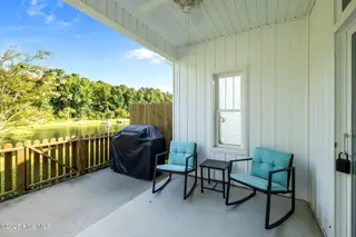 702 Pirates Landing Drive, Beaufort, NC 28516 – photo 5: Coverd, Fenced-In Rear Patio
