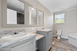 6830 Lewis Drive SE, Winnabow, NC 28479 – photo 22: Master bathroom