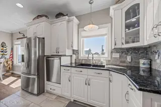 117 Sandfiddler Lane, Harkers Island, NC 28531 – photo 13: 33-web-or-mls-117 Sandfiddler Ln 049