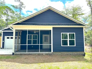 321 NE 52nd Street, Oak Island, NC 28465 – photo 8: IMG_4495