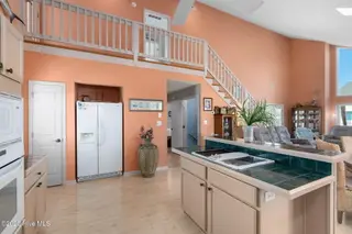 117 Island Quay Court, Atlantic Beach, NC 28512 – photo 14: Open concept kitchen