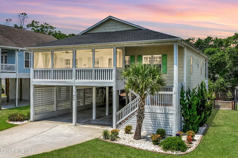 409 Womble Street, Oak Island, NC 28465 – photo 1 of 69: WELCOME to 409 Womble Street