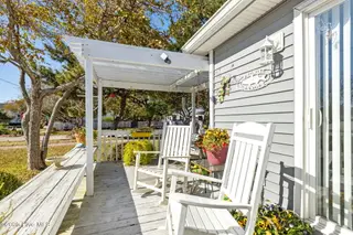 1112 Shepard Street, Morehead City, NC 28557 – photo 24: Porch off primary bedroom