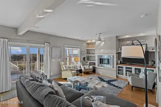 7403 E Beach Drive, Oak Island, NC 28465 – photo 16: Open & Airy Coastal Living