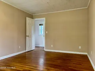 580 Gillikin Road, Beaufort, NC 28516 – photo 12: Primary Bedroom w/ Hardwood Floors