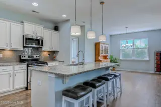 520 Slippery Rock Way, Calabash, NC 28467 — 3-bedroom home in The Farm, Calabash, NC, photo 5 of 33: Kitchen/Dining