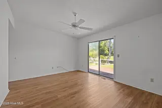 304 Lord Granville Drive, Morehead City, NC 28557 – photo 19: Downstairs Primary Bedroom 1