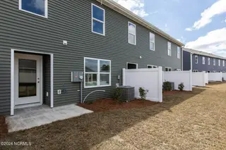 5835 Harebell Road Unit 141, Leland, NC 28451 – photo 21: Back of Townhomes