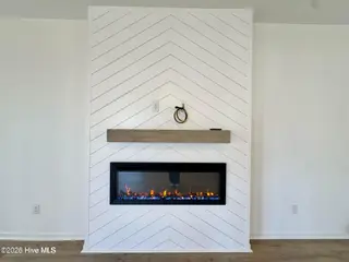 2012 Red Woodpeckers Court, Leland, NC 28451 — 3-bedroom home in Terrapin, Leland, NC, photo 7 of 23: Fireplace
