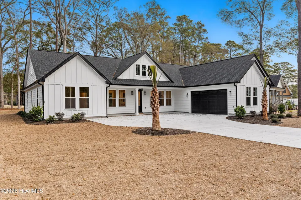 822 Shoreline Drive W, Sunset Beach, NC 28468 – photo 1 of 56: .
