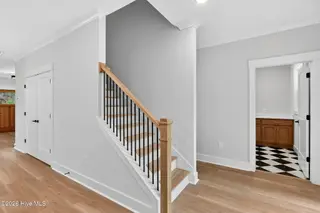 2303 Chestnut Street, Wilmington, NC 28405 — 3-bedroom home in Chestnut Heights, Wilmington, NC, photo 20 of 53: Stairs and Laundry room