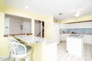 301 Salter Path Road 14 Genesis, Pine Knoll Shores, NC 28512 – photo 22: Spacious, eat-in kitchen w/ island