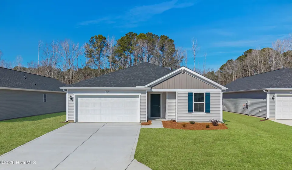 7087 Woodline Drive SW, Sunset Beach, NC 28468 – photo 1 of 38: Venture 7087 Woodline Dr SW Lot 25 - 01