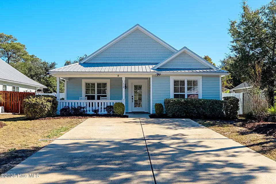 118 NW 11th Street, Oak Island, NC 28465 – photo 1 of 47: shniderproductions.com-37 (1)