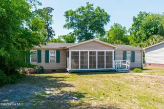 628 Magnolia Drive, Sunset Beach, NC 28468 – photo 1: 628-Magnolia-Dr-Sunset-Beach01