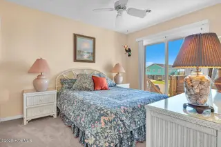 1708 W Beach Drive, Oak Island, NC 28465 – photo 23: 22-Final 1708 W Beach Dr OKI-RJREM-1871