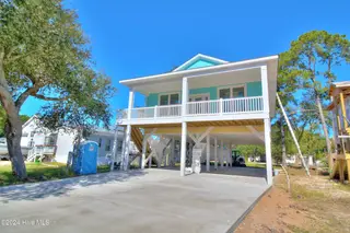 6926 Beach Drive SW, Ocean Isle Beach, NC 28469 — 3-bedroom home in Pine Acres, Ocean Isle Beach, NC, photo 2 of 12: Front 3