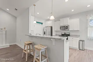 106 NW 19th Street, Oak Island, NC 28465 – photo 10: 31-web-or-mls-DSC01467
