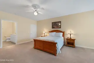221 Woodlands Way Unit 21, Calabash, NC 28467 — 2-bedroom condo in Crow Creek, Calabash, NC, photo 14 of 39: Oversized Walk-in Closet in Primary
