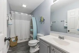 1803 W Yacht Drive, Oak Island, NC 28465 – photo 18: Guest Bathroom