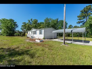 6883 Eastbrook Avenue SW, Ocean Isle Beach, NC 28469 — 2-bedroom manufactured home in Pine Acres, Ocean Isle Beach, NC, photo 7 of 25: mls-DSC00925