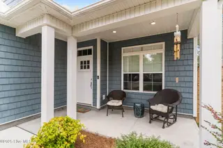 162 NW 9th Street, Oak Island, NC 28465 – photo 3: front porch 2