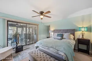 10051 Windward Drive, New Bern, NC 28560 – photo 10: MASTER BEDROOM OPEN TO PORCH