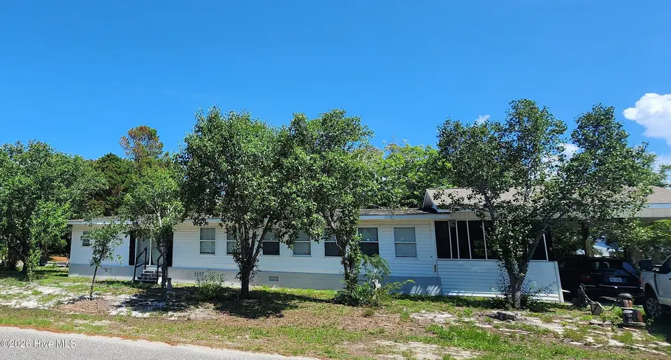 202 NE 66th Street, Oak Island, NC 28465 – photo 1 of 25