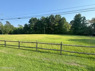 6221 Chadbourn Highway, Chadbourn, NC 28431 – photo 3: Fence across front of property