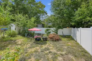 121 NE 6th Street, Oak Island, NC 28465 – photo 19: 07_121_NE_6th_St-Exterior-GE13