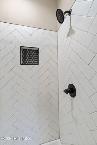 113 Twin Oaks Place, Goldsboro, NC 27530 – photo 24: vertical tiled walk in shower