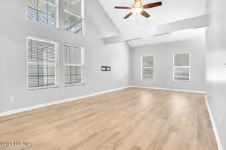 127 NW 19th Street, Oak Island, NC 28465 – photo 3: Cathedral Ceiling Living room