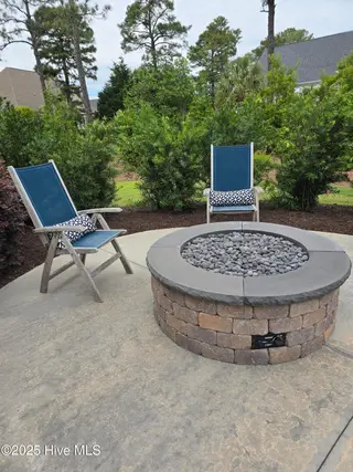 3982 Wyndmere Drive, Southport, NC 28461 – photo 6: 3982 Wyndmere Dr Patio Firepit