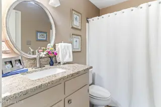 712 Canal Cove Road, Lake Waccamaw, NC 28450 – photo 23: Bathroom 1
