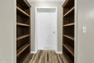 552 Colonial Landing Road SE, Bolivia, NC 28422 – photo 17: 17-web-or-mls-Pantry shelving