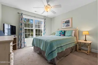 133 NE 3rd Street, Oak Island, NC 28465 – photo 15: Bedroom 2
