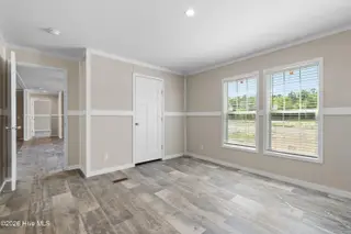 6830 Lewis Drive SE, Winnabow, NC 28479 – photo 19: Master bedroom