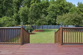 1904 Cambria Drive B, Greenville, NC 27834 – photo 9: Fenced Backyard and a view of the trees!