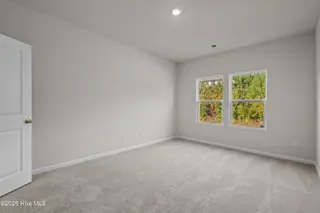 313 Parkington Lane 86a, Ocean Isle Beach, NC 28469 – photo 18: primary bedroom main floor