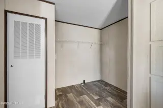 490 Orchard Lane SE, Bolivia, NC 28422 — 3-bedroom manufactured home in Vineyard Plantation, Bolivia, NC, photo 15 of 27: Laundry room